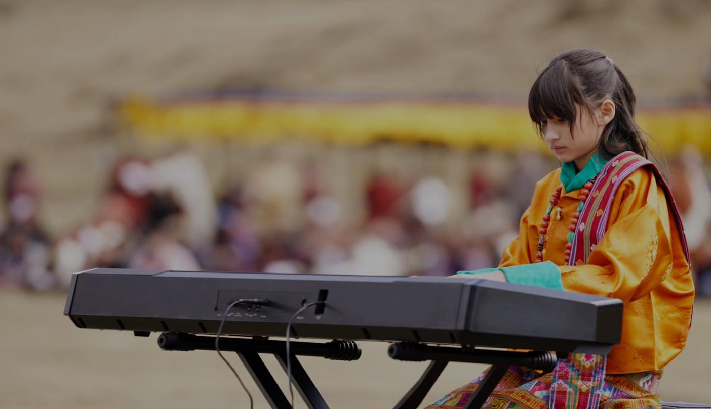 Hillary O’Sullivan playing at the Royal Highland Festival in Laya, Bhutan